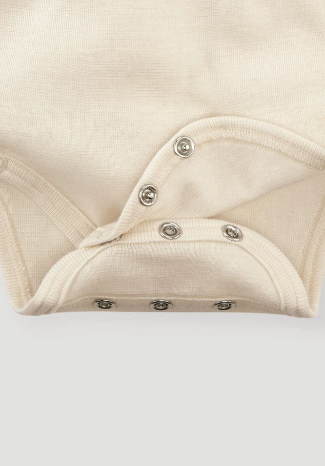 Wrap bodysuit made of organic cotton with organic merino wool and silk