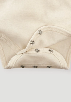 Wrap bodysuit made of organic cotton with organic merino wool and silk