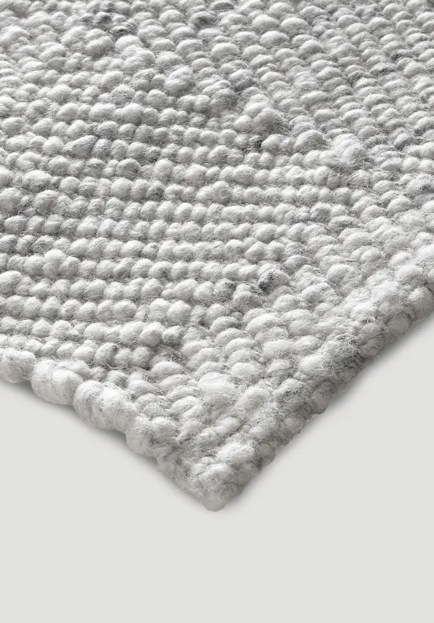 Woven carpet RUGA made from regional new wool