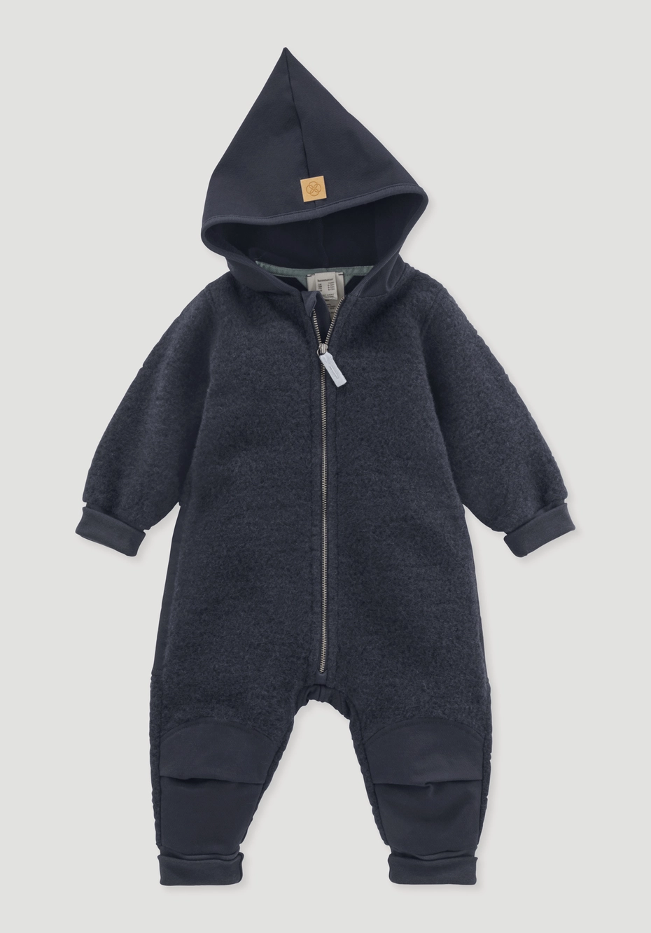 Wool fleece overall made from organic merino wool with softshell