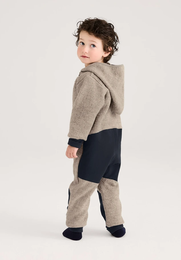Wool walk overall made of organic merino wool with softshell