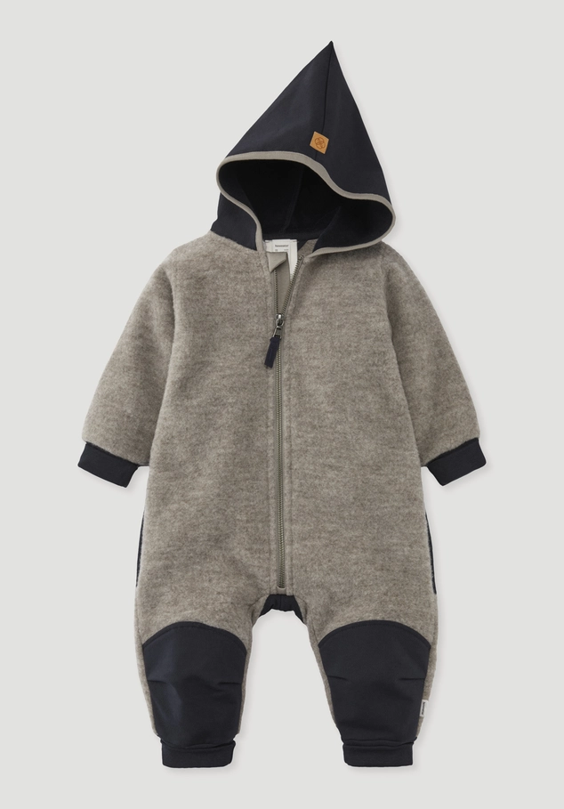 Wool fleece overall made from organic merino wool with softshell