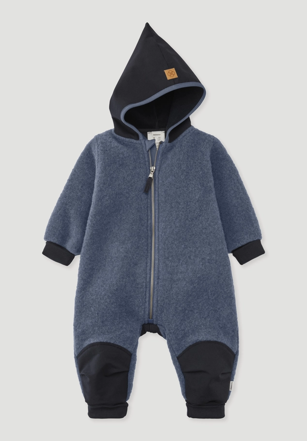 Wool fleece overall made from organic merino wool with softshell