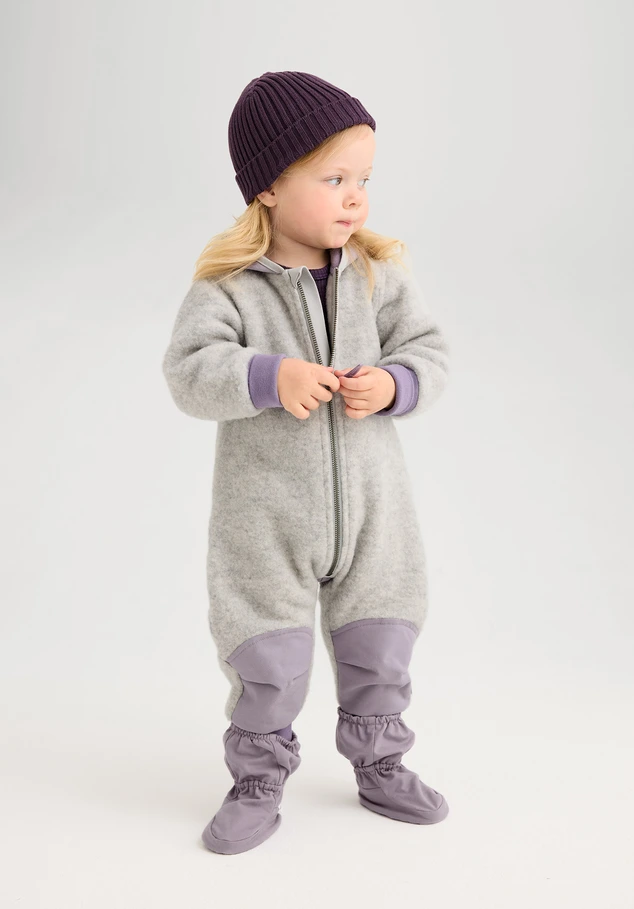 Wool fleece overall made from organic merino wool with softshell